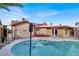 Backyard pool with poolside relaxation area for the ultimate backyard relaxation experience at 5005 Harmony Ave, Las Vegas, NV 89107