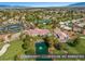 Beautiful aerial view showcasing a community clubhouse with various amenities amidst a lush landscape at 5104 Elm Grove Dr, Las Vegas, NV 89130