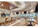 Stylish clubhouse interior featuring a bar area, comfortable seating, and scenic views for residents' enjoyment at 5104 Elm Grove Dr, Las Vegas, NV 89130