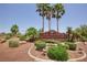 Elegant entrance sign to Los Prados Golf Community & Country Club surrounded by manicured landscaping at 5104 Elm Grove Dr, Las Vegas, NV 89130