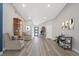 Inviting foyer with comfortable seating area and stylish decor at 5104 Elm Grove Dr, Las Vegas, NV 89130