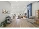 Open-concept living room with dining area and kitchen in the background at 5104 Elm Grove Dr, Las Vegas, NV 89130