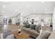 Spacious living room with hardwood floors, neutral color palette, and lots of natural light at 5104 Elm Grove Dr, Las Vegas, NV 89130