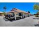 Exterior view of the pro shop featuring golf carts parked outside and signage at 5104 Elm Grove Dr, Las Vegas, NV 89130