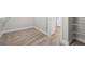 Spacious walk-in closet featuring carpet flooring and wire shelving with access to the bathroom at 5104 Elm Grove Dr, Las Vegas, NV 89130
