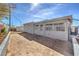 Backyard featuring a patio area and the exterior of the home at 513 Elm St, Boulder City, NV 89005