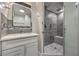 Beautiful renovated bathroom featuring stylish tile and a walk-in shower at 513 Elm St, Boulder City, NV 89005