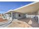 Covered parking area attached to the home provides ample space for vehicles at 513 Elm St, Boulder City, NV 89005