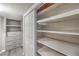 Walk-in closet with built-in shelves and drawers for optimal organization at 513 Elm St, Boulder City, NV 89005