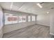 Bright sunroom with multiple windows and neutral finishes at 513 Elm St, Boulder City, NV 89005