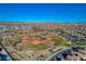 Panoramic shot featuring a well-equipped community baseball park amidst neatly planned residential streets at 5741 Shadow Bend Dr, Las Vegas, NV 89135