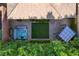 Aerial view of a backyard featuring a hot tub, artificial grass, patio with pergola at 5741 Shadow Bend Dr, Las Vegas, NV 89135