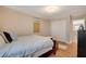 Inviting bedroom with hardwood floors, closet, and light walls at 5741 Shadow Bend Dr, Las Vegas, NV 89135