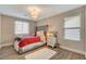 Bedroom featuring a comfortable bed, a nightstand, a stylish lamp, and soft decor for a cozy retreat at 5741 Shadow Bend Dr, Las Vegas, NV 89135