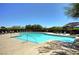 Large, clear community pool with lounge chairs, perfect for relaxing and swimming at 5741 Shadow Bend Dr, Las Vegas, NV 89135