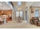 Bright dining area featuring tile floors, high ceilings, and easy access to the kitchen and living areas at 5741 Shadow Bend Dr, Las Vegas, NV 89135