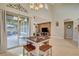 Dining area with sliding glass doors to patio, adjacent to the living room and kitchen at 5741 Shadow Bend Dr, Las Vegas, NV 89135