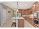 Beautiful kitchen featuring a center island, stainless steel appliances, and ample storage at 5741 Shadow Bend Dr, Las Vegas, NV 89135