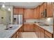 Kitchen with stainless steel appliances, granite countertops, and ample cabinet space at 5741 Shadow Bend Dr, Las Vegas, NV 89135