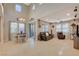 Living room with high ceilings, tile floors, and an open floor plan at 5741 Shadow Bend Dr, Las Vegas, NV 89135