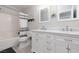 This bathroom is modern and bright, featuring double sinks and a shower/tub combo at 575 Lacabana Beach Dr, Las Vegas, NV 89138