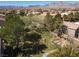 Lush green space featuring mature trees and desert landscaping at 575 Lacabana Beach Dr, Las Vegas, NV 89138