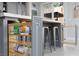 Kitchen island features bar seating, storage, and modern finishes in an open layout at 575 Lacabana Beach Dr, Las Vegas, NV 89138