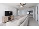 Comfortable living room with modern sectional sofa and neutral decor at 575 Lacabana Beach Dr, Las Vegas, NV 89138