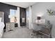 Bright main bedroom with a work desk and a view to the outside at 575 Lacabana Beach Dr, Las Vegas, NV 89138