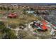 Aerial view of a modern playground with colorful equipment, shaded areas, and walking paths at 575 Lacabana Beach Dr, Las Vegas, NV 89138