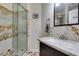 Stylish bathroom featuring a glass-enclosed shower and modern fixtures at 6686 Enchanted Cove Ct, Las Vegas, NV 89139