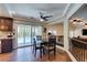 Bright breakfast nook with sliding glass doors that let you see the pool at 6686 Enchanted Cove Ct, Las Vegas, NV 89139