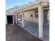 Back patio area featuring a covered space and a utility shed at 6760 Fallona Ave, Las Vegas, NV 89156
