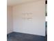 Spacious room features soft pink walls and simple white shelving at 6760 Fallona Ave, Las Vegas, NV 89156