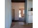 View of the kitchen and entryway, showcasing layout and flow at 6760 Fallona Ave, Las Vegas, NV 89156