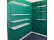 Room featuring shelves and green walls at 6760 Fallona Ave, Las Vegas, NV 89156