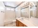 Bright bathroom featuring a shower-tub combo and a vanity sink at 7267 Sequoia Springs Dr, Las Vegas, NV 89147