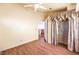 Bedroom featuring wood floors, ceiling fan, and closet at 7267 Sequoia Springs Dr, Las Vegas, NV 89147