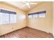 Bedroom with a window and laminate floors at 7267 Sequoia Springs Dr, Las Vegas, NV 89147