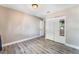 Spacious bedroom with closet, neutral walls, and modern floors at 7817 Aplin Ave, Las Vegas, NV 89145