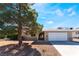 Inviting single-story home featuring a well-maintained front yard and a convenient two-car garage at 7817 Aplin Ave, Las Vegas, NV 89145