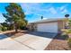 Charming single-story home with a spacious driveway and an attached two-car garage, perfect for families at 7817 Aplin Ave, Las Vegas, NV 89145