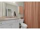 Bathroom features a single sink vanity, neutral tones, and a separate toilet area at 8 Via Dolcetto, Henderson, NV 89011