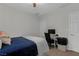 Bright bedroom featuring modern decor, a ceiling fan, and a dedicated workspace at 8 Via Dolcetto, Henderson, NV 89011