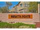 Regatta Pointe community sign featuring lush landscaping at 8 Via Dolcetto, Henderson, NV 89011