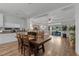 Dining Area shows an open floorplan with hard surface floors, white cabinets, and bright light at 8 Via Dolcetto, Henderson, NV 89011