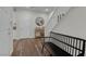 Entry way foyer with staircase, hardwood floors and bench at 8 Via Dolcetto, Henderson, NV 89011