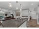Spacious kitchen with granite countertops, stainless steel appliances, and open floor plan at 8 Via Dolcetto, Henderson, NV 89011