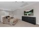 Upstairs bonus room features a comfortable chaise lounge and entertainment center at 8 Via Dolcetto, Henderson, NV 89011