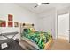 Bright bedroom with a Minecraft-themed bed and a keyboard set up for musical expression at 803 Bolide St, Las Vegas, NV 89138
